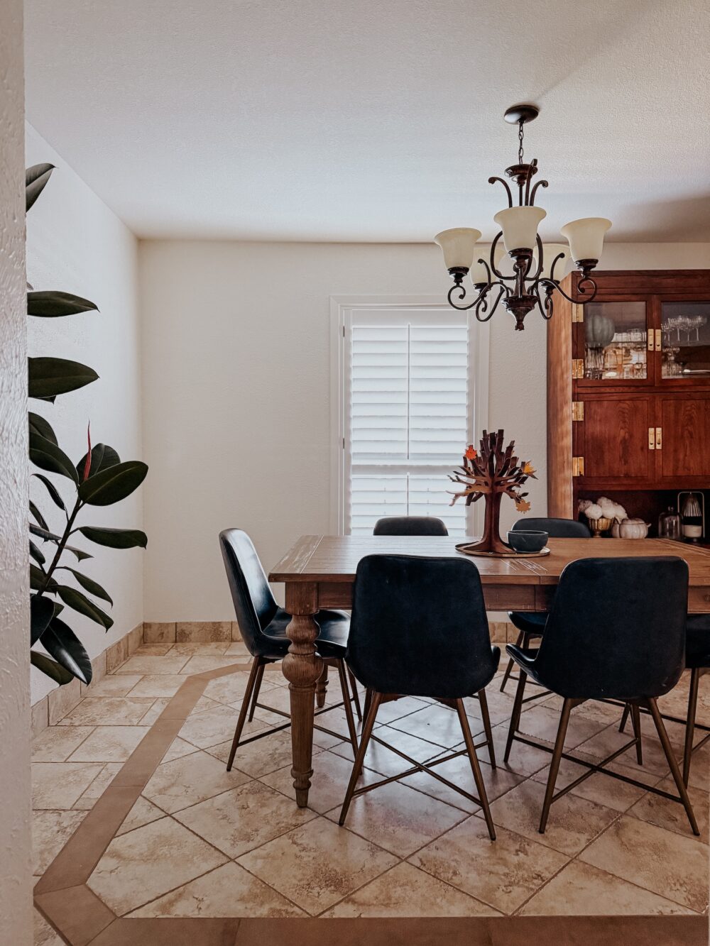 dining room with a turned leg dining room table