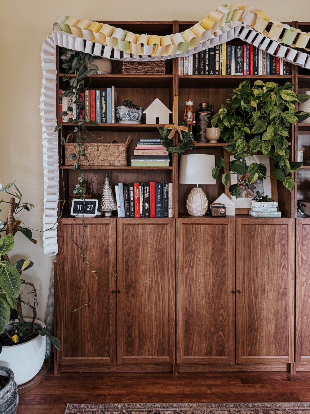 office with DIY paper chain garland on the bookcases 