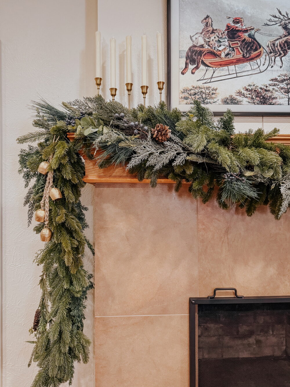 close up of fireplace mantel decorated for Christmas