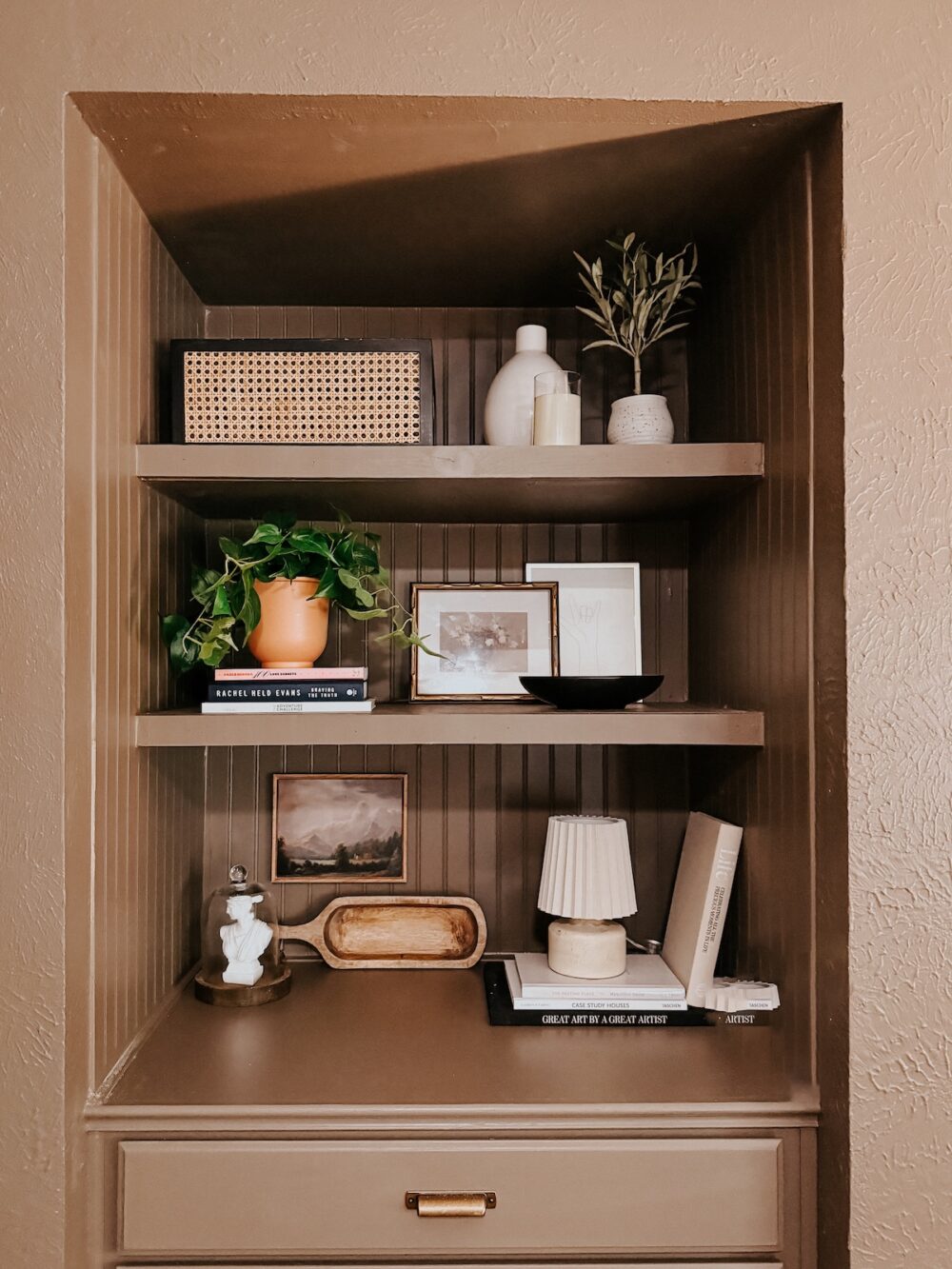 three built in shelves with simple styling