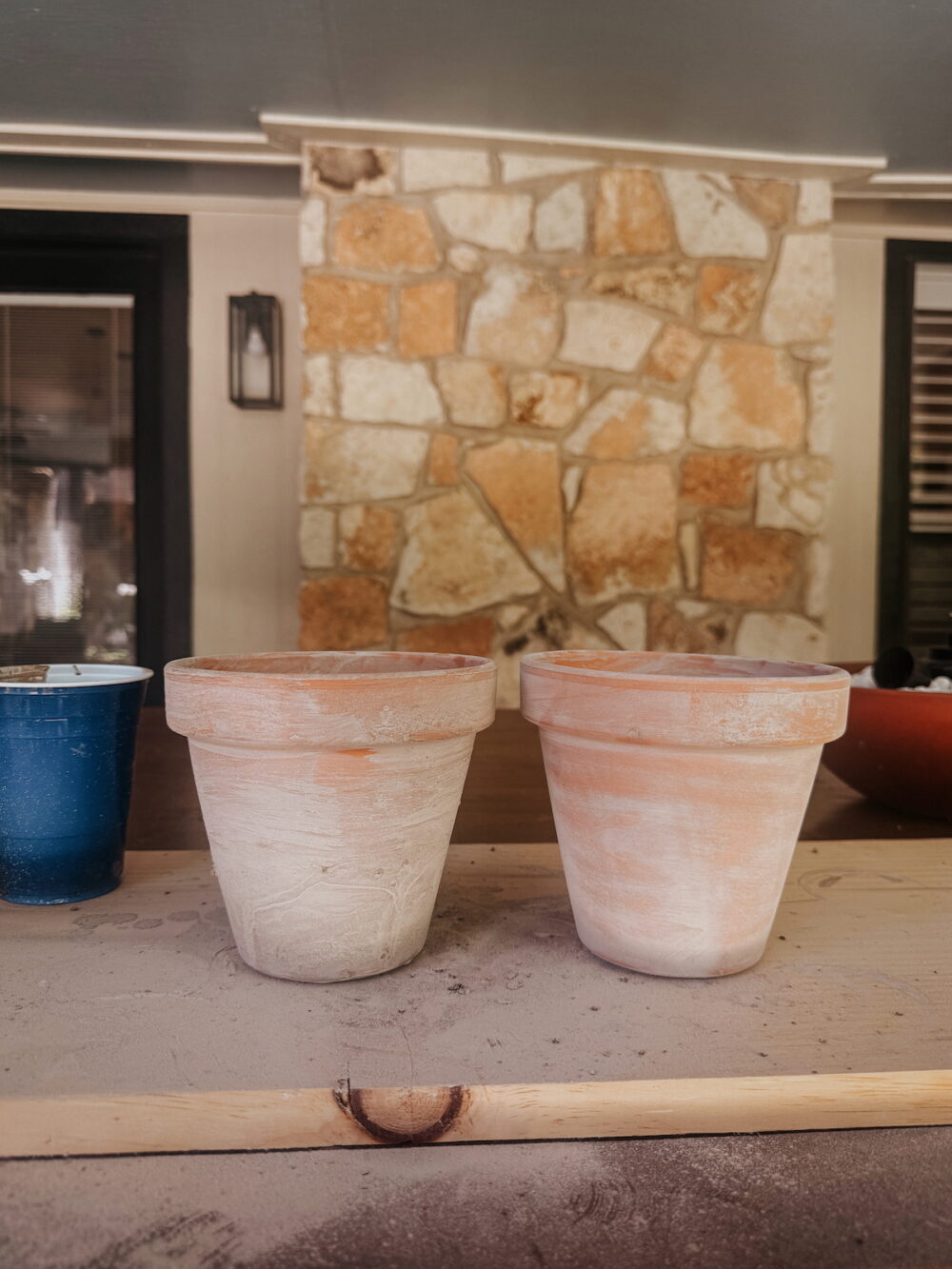 before and after sanding aged terra cotta pots