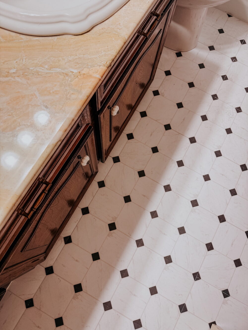 overhead image for floorpops peel and stick tiles in a small bathroom