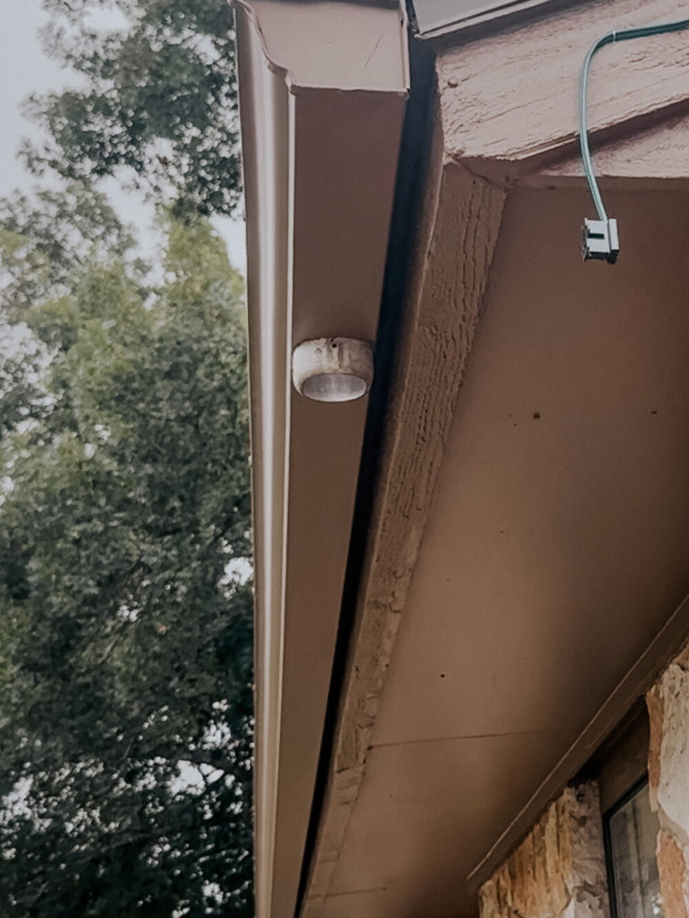 close up of a cutter with the downspout removed